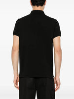 Moncler Black Polo Shirt with Statement Embroidered Logo
