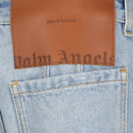Distressed Flared Denim Jeans