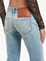 Distressed Flared Denim Jeans