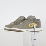B57 Low-Top Sneakers in Taupe with Yellow CD Signature