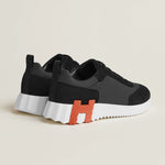 Bouncing Sneakers in Black and Orange