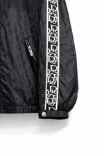 Oblique Hooded Windbreaker Jacket with Signature Sleeve Bands
